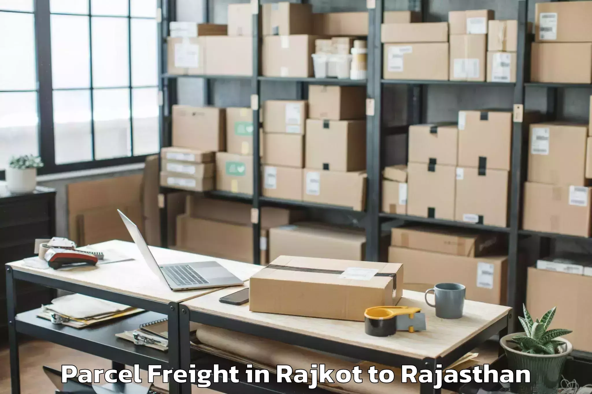 Book Rajkot to Basni Parcel Freight Online